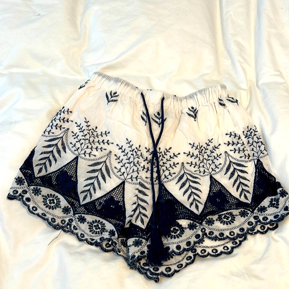 Blue and white embroidered shorts